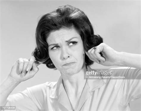 Woman Fingers Ears Photos And Premium High Res Pictures Getty Images