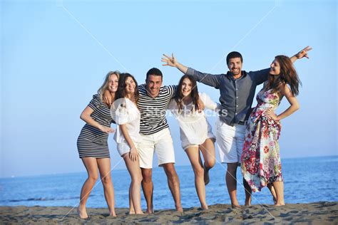 Happy Young People Group Have Fun On Beach Royalty Free Stock Image