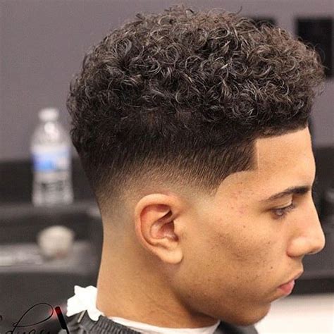 Curly hair might occasionally feel like a tangled curse you didn't ask for, don't deserve and definitely the easiest and most versatile way to manage unruly hair is with a short back and sides haircut that. The Curly Hair Fade | Men's Hairstyles + Haircuts 2017