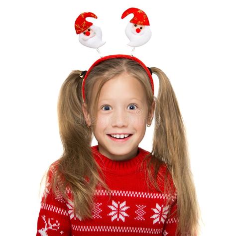 Portrait Of A Smiling Child In A Christmas Costume Photo On A Stock