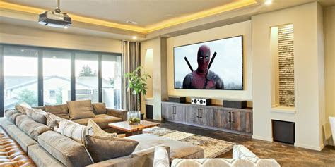 Captivating home theater interior decorations for movie theater decorations for room theater room wall decorations movie theme decorations cheap movie room decor elegant home theater design ideas with brown wall paint and wooden cabinets featuring lather sofa and. How to Build a Home Theater on the Cheap | MakeUseOf