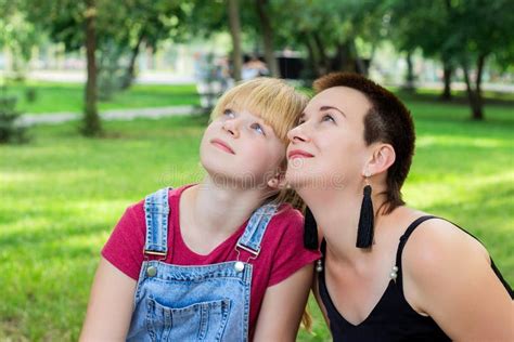 Mom And Daughter Look Up Stock Photo Image Of Park 157595076
