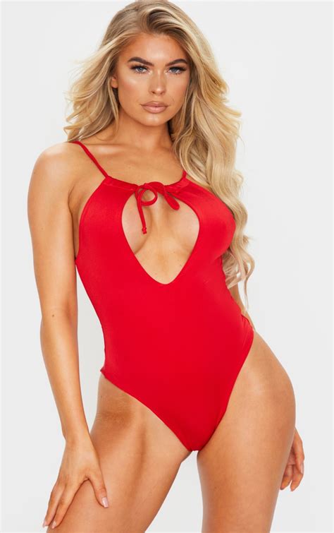 red ruched neck cut out halterneck swimsuit prettylittlething
