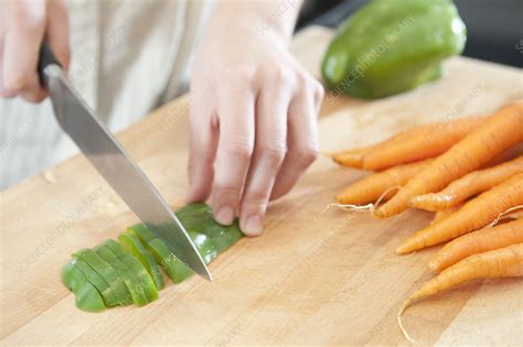 Woman Chopping Vegetables Stock Image F0035963 Science Photo Library