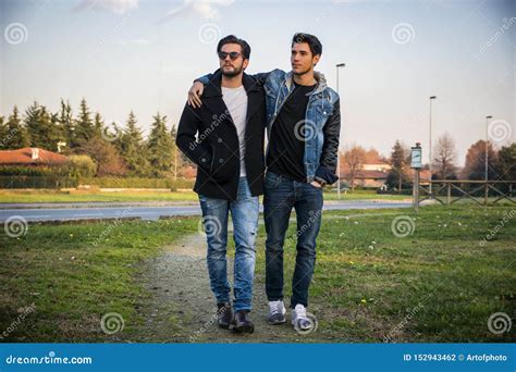 Two Handsome Young Men Friends In A Park Stock Photo Image Of
