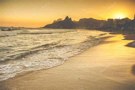 Warm Sunset On Ipanema Beach With People Rio De Janeiro Brazil Stock