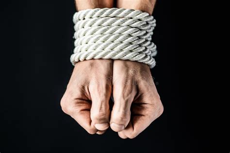 Hands Tied With Rope On Black Background Stock Photo Image Of Hand