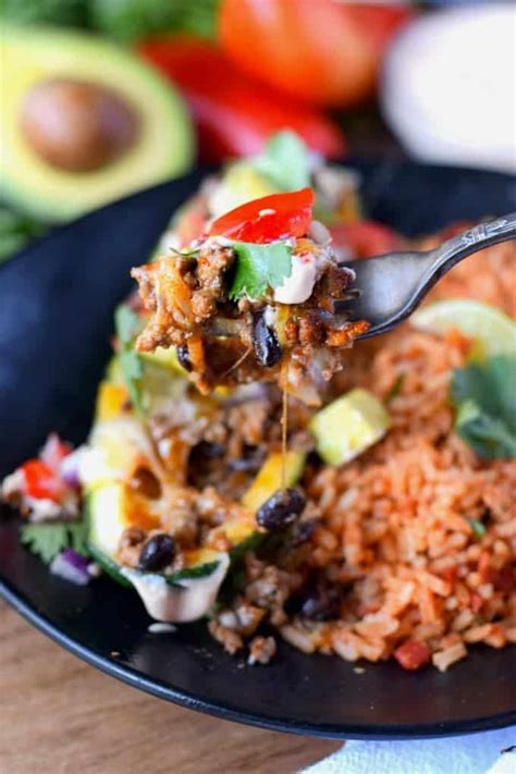 The abundance of zucchini in the summer is seriously the best. Taco Stuffed Zucchini Boats Recipe - Butter Your Biscuit