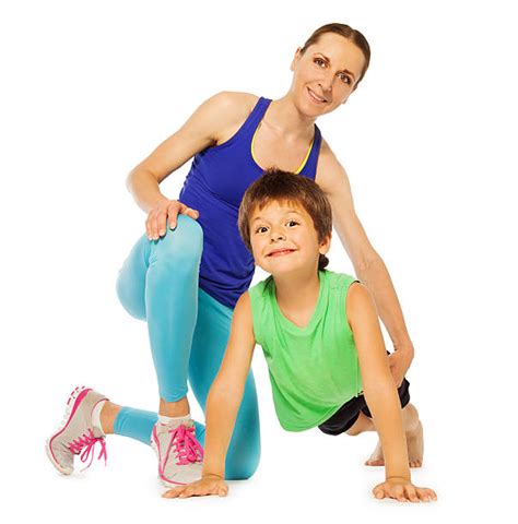 Trainer Helping Woman Do Push Ups Stock Photos Pictures And Royalty Free