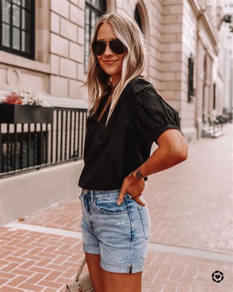 How Fashion Girls Are Styling Denim Shorts This Season The Everygirl
