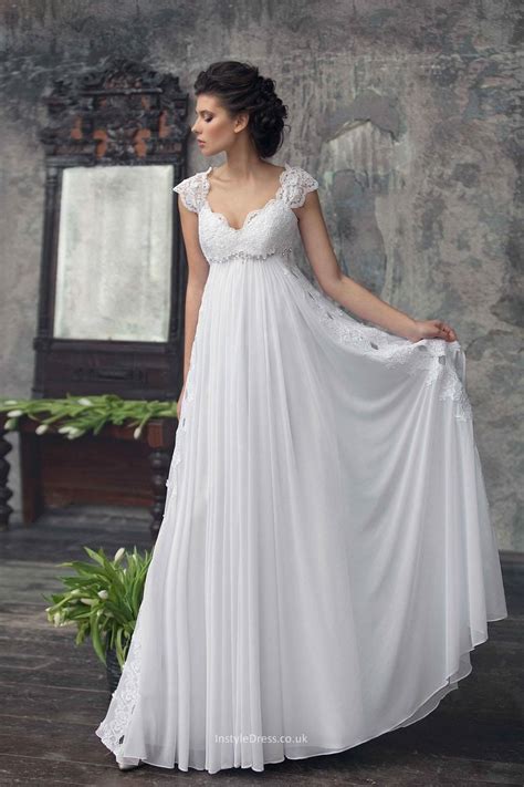 An Elegant A Line Dress In Empire Style With A Decorated Lace Keyhole