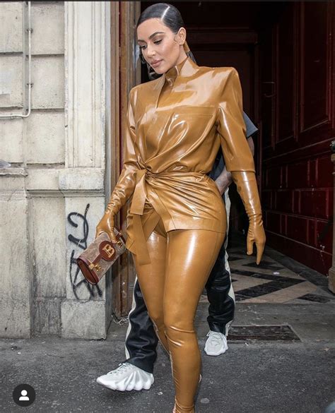 Fresh Off The Runway Kim Kardashian Wears Three Latex Balmain Ensembles During Fashion Week In