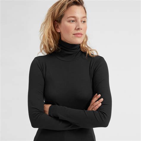 a turtleneck that you can layer this fitted long sleeve is made from stretchy finely ribbed