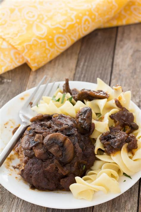 Smothered steak / salisbury steak with homemade mushroom gravy recipe. Easy Salisbury Steak Recipe | Pear Tree Kitchen