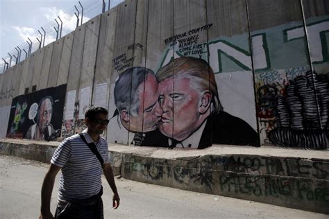 Netanyahu And Trump Kiss In West Bank Security Barrier Graffiti The Times Of Israel