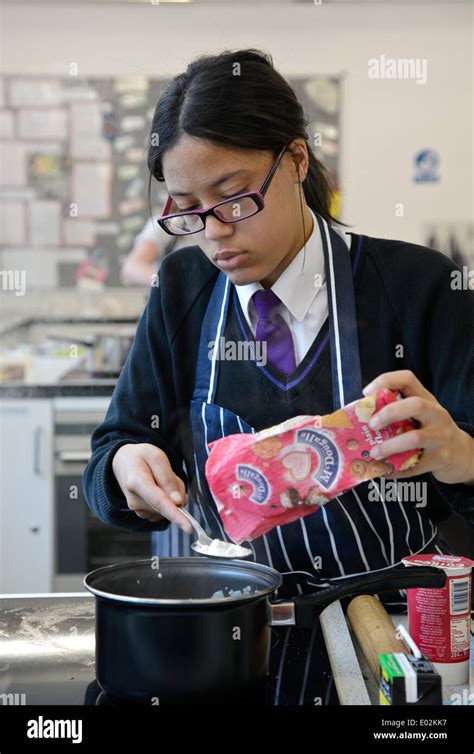 School Pupils Students Cooking During A Home Economics Class At Their