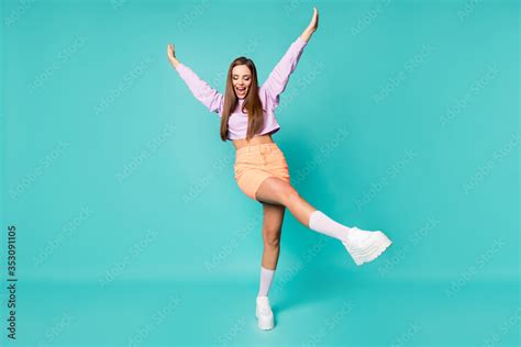 Full Body Photo Of Funky Cool Lady Raise Leg Arms Enjoy Youth Party Dancing Wear Purple Cropped
