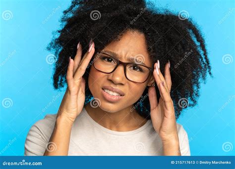 Sceptical Mistrustful African American Girl Adjusts Glasses Suspicious