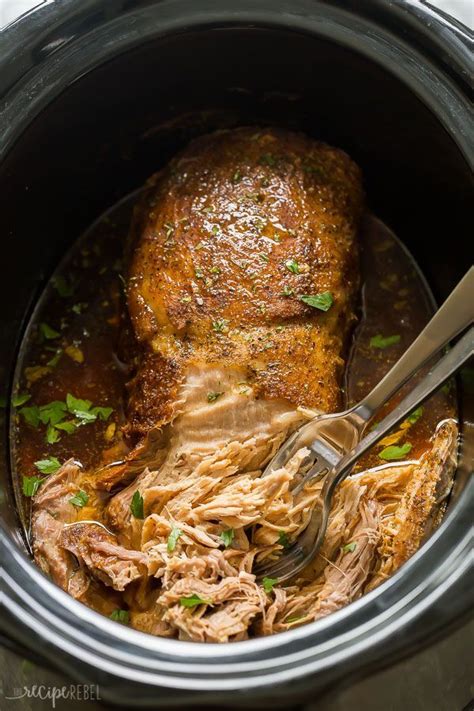 This Easy Slow Cooker Pork Loin Recipe Includes A Flavorful Garlic Herb