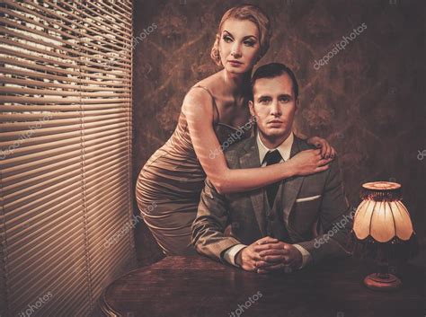 Well Dressed Retro Couple Behind Table Stock Photo Nejron