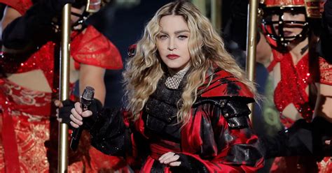 Madonna Pulls Fans Top Down Onstage During Australia Show