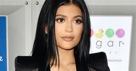Kylie Jenner Sparks Then Shuts Down Breast Implant Rumors In Very