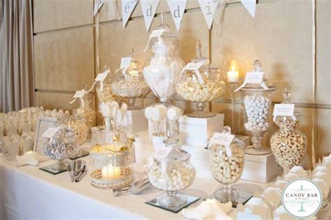 ivory and white wedding candy buffet wedding candy table wedding bar wedding desserts trendy