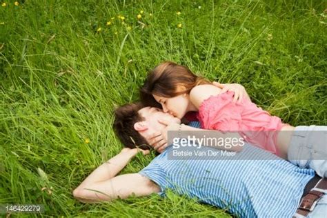Couple Kissing Laying In Grass Kissing Couples Couples Kissing Reference
