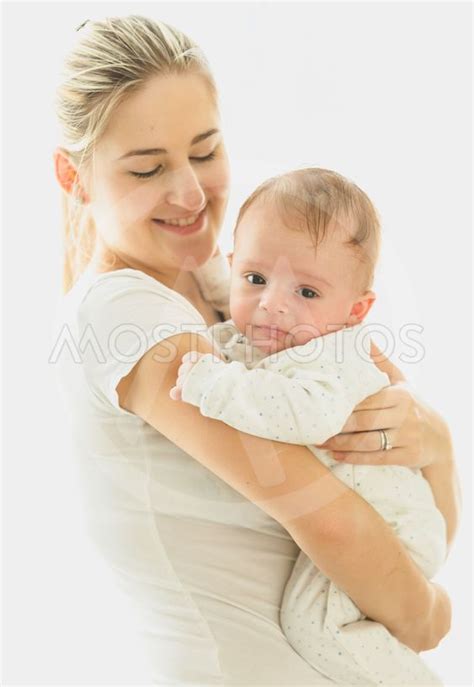 Smiling Caring Mother Cuddl By Kirill Ryzhov Mostphotos