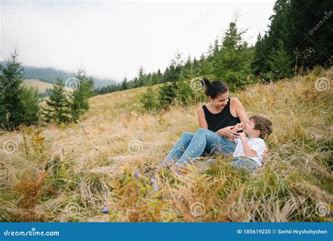 Young Mom With Baby Boy Travelling Mother On Hiking Adventure With