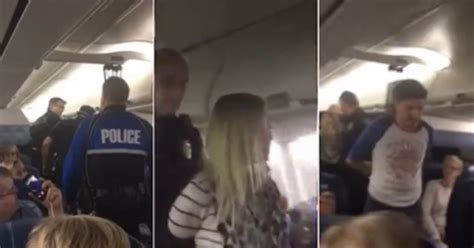 Chaos Escalates When Belligerent Couple Being Thrown Off Plane Turn On Cheering Crowd