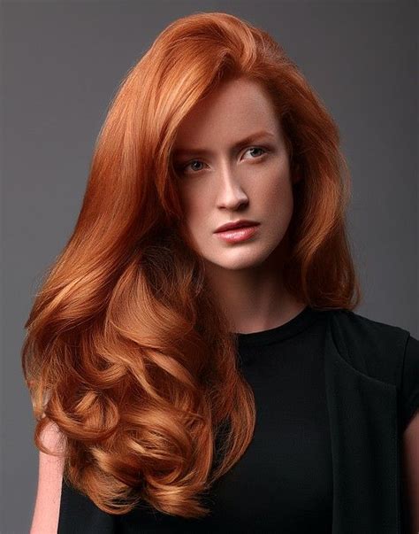 Get a teasing comb and add a little mess to your 'do for the perfect layered hairstyle. Christine Margossian Long Red Hairstyles | Red hair woman ...