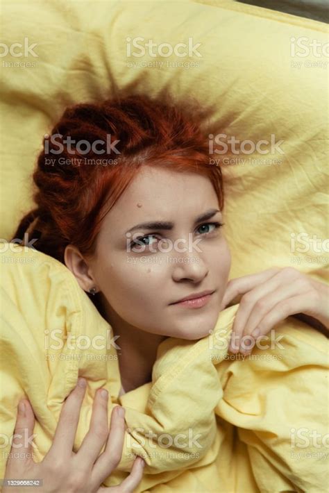 Very Pretty Redhead Girl With Dreads On Bed In Bedroom In The Morning A