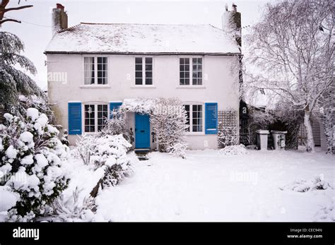 Winter Snow Covered Country Cottage Detached House After A Heavy