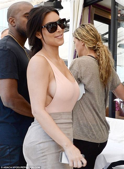 Kim Kardashian Flashes Sideboob As She And Kanye West Step Out In Paris