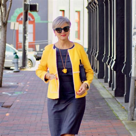 Beth From Style At A Certain Age Wears A Navy Blue Sheath Dress Boden Yellow Jacket Navy Suede