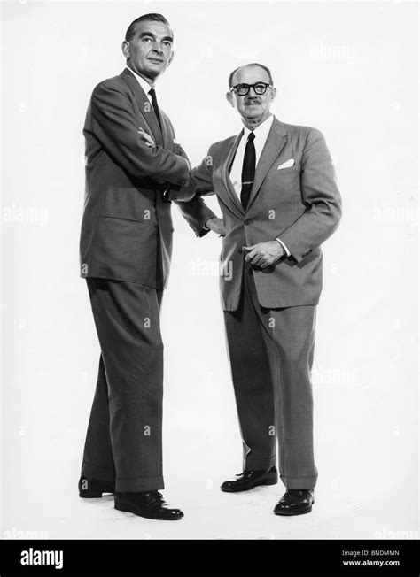 Two Businessmen Standing Together Stock Photo Alamy