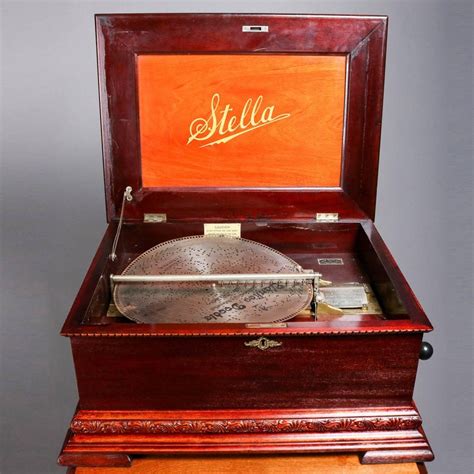 Keeping your antique music box in proper working condition will allow you to enjoy it for a lifetime and even pass it down to future generations who can then have the opportunity to hold history in their hand. Antique Stella Double Comb Music Box with Mahogany Case and Stand, 19th Century at 1stdibs