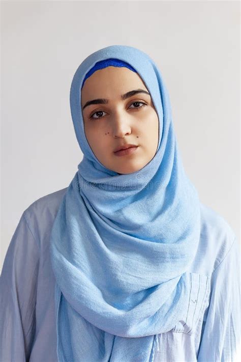 beautiful muslim woman in hijab against white background portrait of pretty middle eastern