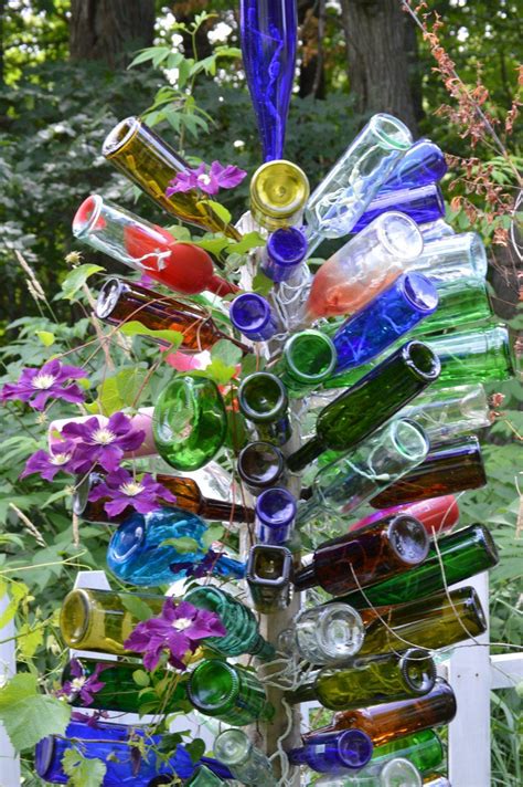 Diy How To Make A Bottle Tree For Your Garden In 2020 With Images Wine Bottle Diy Wine