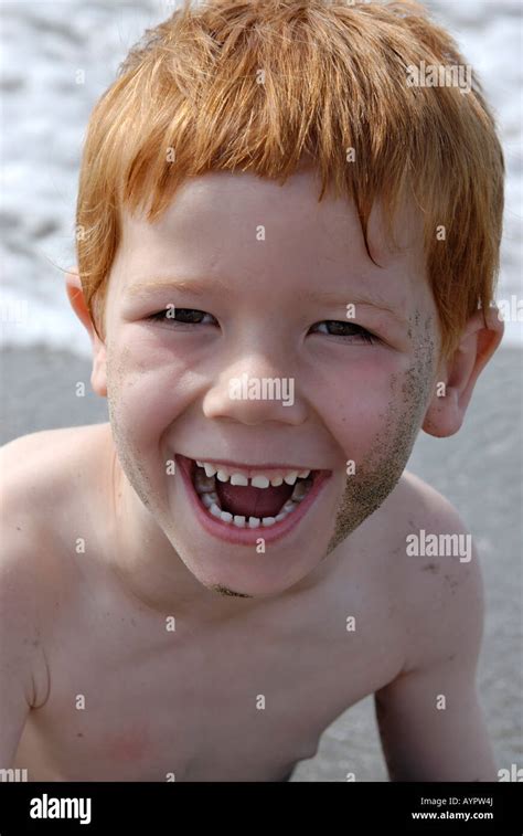 Boy Laying In The Water Having Fun At The Beach Stock Photo Alamy
