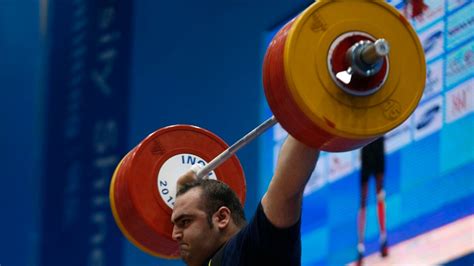 Georgian Weightlifter Sets Record Wins Gold Besting Iranian Champion