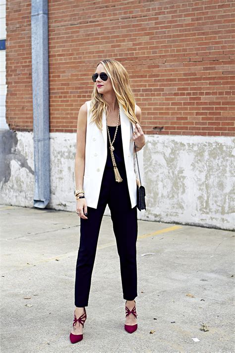 White blazer with black dress shorts and black suede booties. WHITE VEST | Fashion Jackson