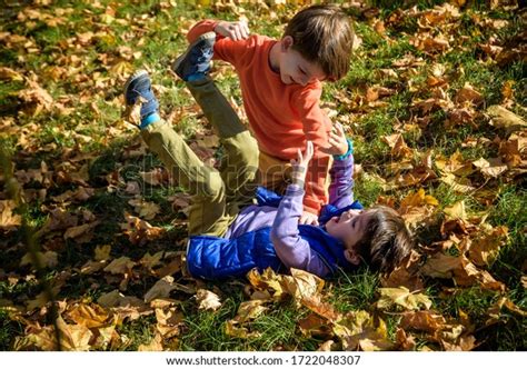 Two Boys Fighting Outdoors Friends Wrestling Stock Photo Edit Now