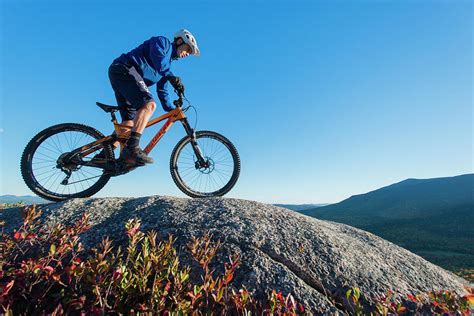 Mountain Biker Riding On The Rocky Photograph By Joe Klementovich