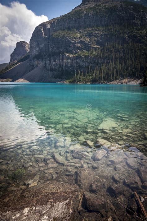 Crystal Clear Water Of Moraine Lake Near Banff Alberta Stock Image