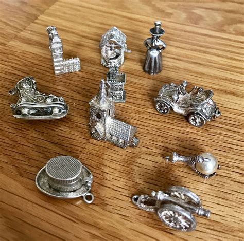 Vintage Sterling silver charms - 10 in total