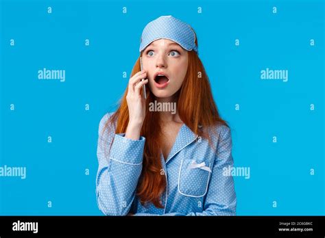 Surprised And Amazed Wondered Redhead Girl Gasping Impressed Talking On Phone Gossiping With