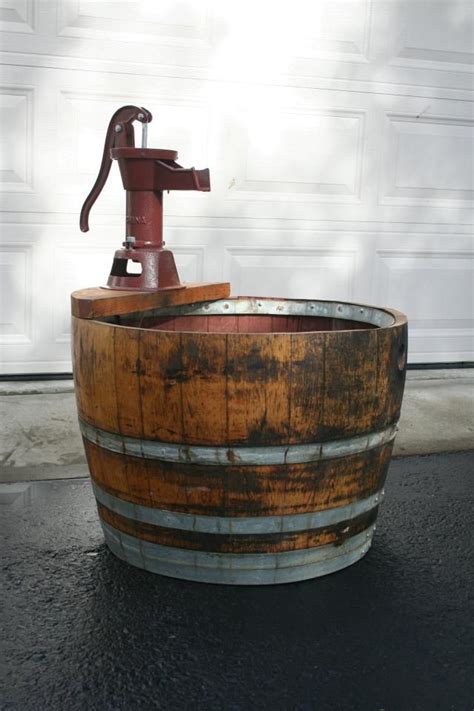 Wine Barrel And Old Fashion Water Hand Pump Fountain Every Yard Needs