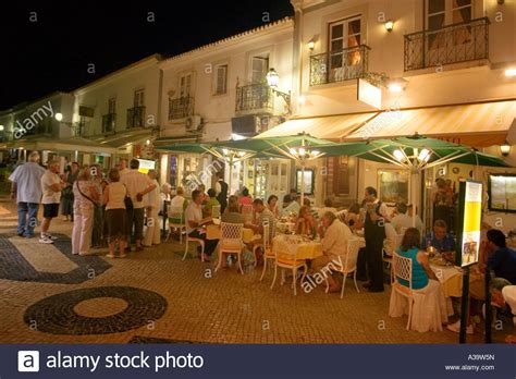 Portugal Algarve Lagos main street nightlife restaurants twilight Stock